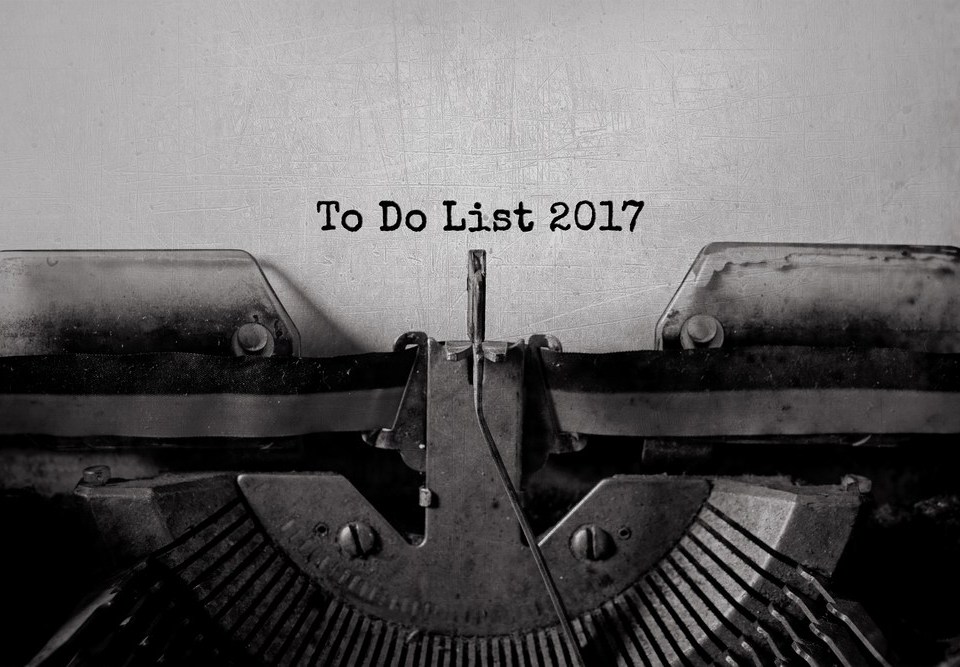 A typewriter holds a paper with the words "To Do List 2017"